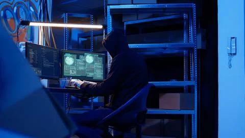 Hacker getting past digital devices security and stealing valuable sensitive 写真素材