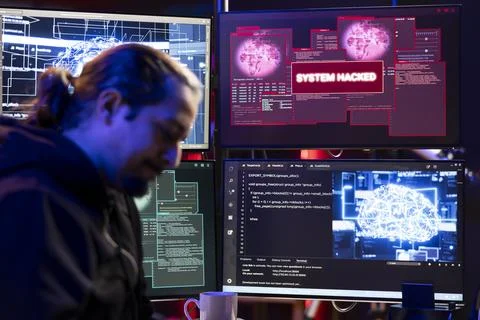 Hacker getting system hacked popup alert on computer display screen Stock Photos