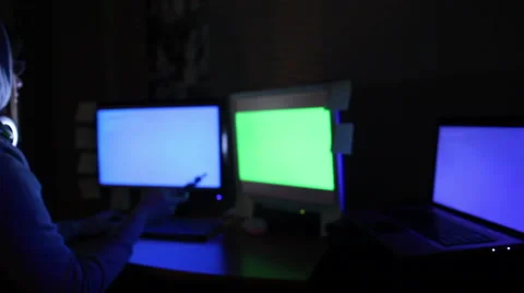 Hacker girl works at the computer and smoking electronic cigarette Stock Footage 62618445