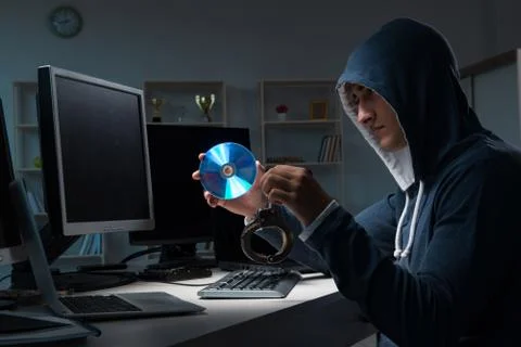 Hacker hacking computer at night Stock Photos