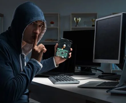 Hacker hacking computer at night Stock Photos
