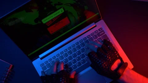 Hacker Hacking a Laptop Computer Programing a Virus Stock Footage 95702273