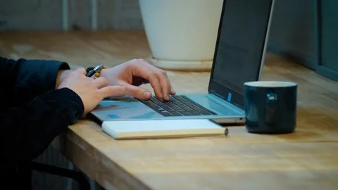 The hacker hacks the program. Close-up of hands. Stock Footage 172258537