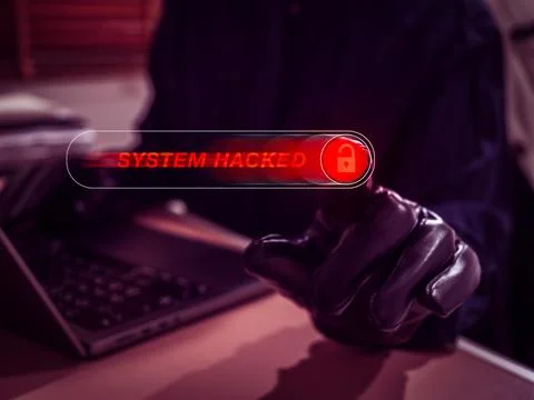 Hacker hand pressing on red warning sliding button with "System Hacked" tex.. Stock-Fotos