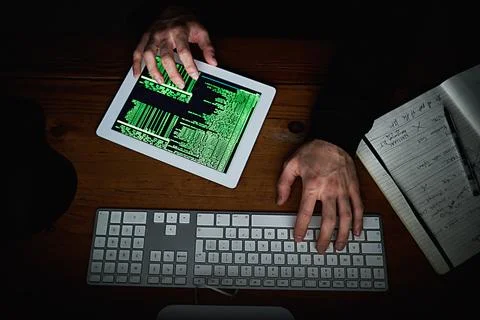 Hacker, hands and tech for typing code for access, online scam and programming Stock Photos