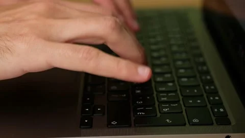 Hacker hands typing code on laptop keyboard, light of police emergency lights. Stock-Footage 165267246