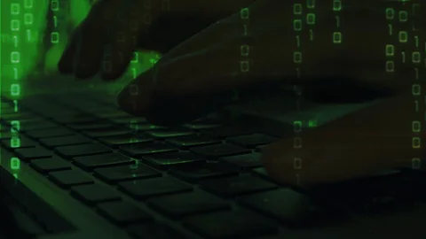 Hacker hands typing on laptop keyboard Stock Footage 129893151