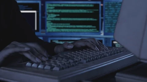 Hacker hands typing on an old computer keyboard Stock Footage 125587510