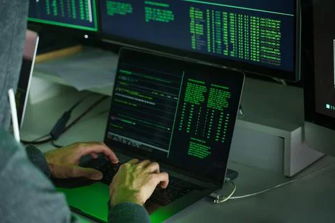 Hacker hands using laptop keyboard computer to code Foto stock