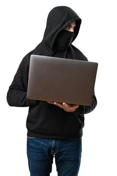 Hacker with his computer looking lateral on isolated white background 写真素材