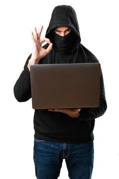 Hacker with his computer making OK sign on isolated white background 写真素材