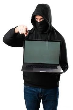 Hacker with his computer pointing to the front on isolated white background 스톡 사진