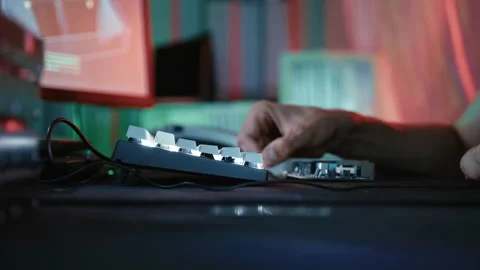 Hacker holding a computer circuit board Stock Footage 341661672