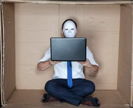 Hacker holds a computer Stock Photos