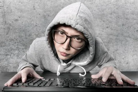 Hacker in the hood Stock Photos
