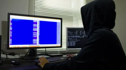Hacker in hood stealing information Stock Footage 53102152