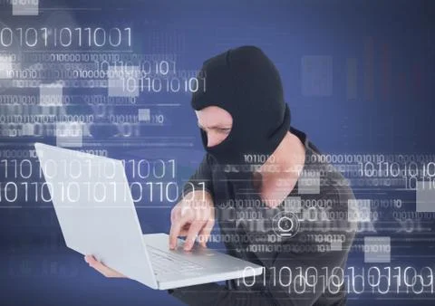 Hacker with hood using a laptop in front of 3D blue background Stock Photos