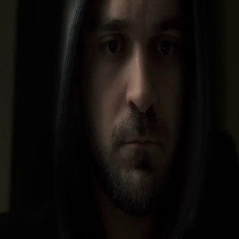 Hacker hooded while focused to work on computers Stock Footage 69508935