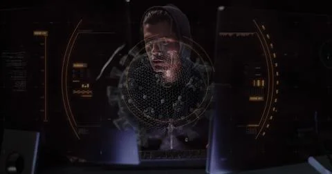 Hacker in hoodie analyzing data on multiple screens in dark room 写真素材