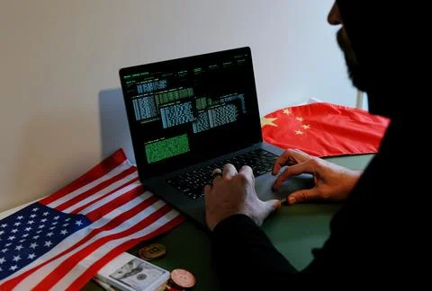 Hacker in Hoodie Running Terminals Command Station 스톡 사진