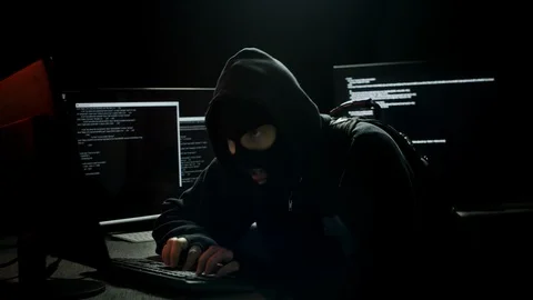 Hacker Infiltrating Computer Systems Stealing Data Stock Footage 115834713
