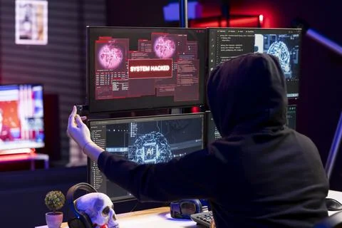 Hacker inserting flash drive in PC to bypass security using exploit. Stock Photos