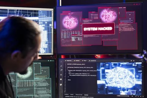 Hacker installing spyware using neural networks tech to secretly gather data Stock Photos