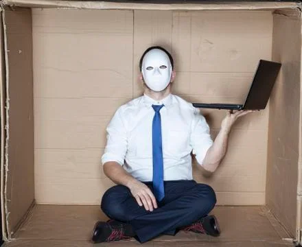 Hacker keep computer in his hand Foto stock