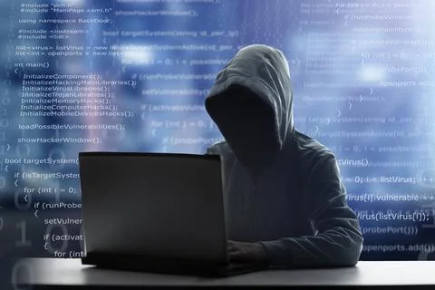 Hacker at laptop. Malware and virus. Stockfoto's