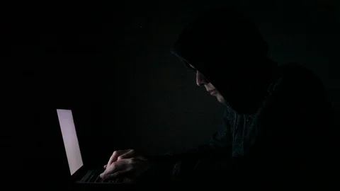 Hacker with laptop by night, internet security concept Stock Footage 98100736