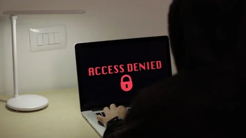Hacker on laptop, security on internet. Green Display, Access denied message Stock Footage 149777798