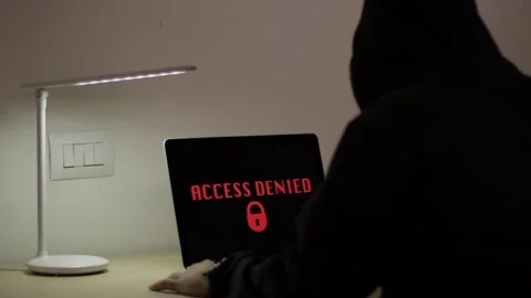 Hacker on laptop, security on internet. Green Display, Access denied message Stock Footage 149778070