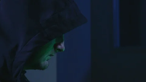 Hacker with laptop typing 2 Stock Footage 102848525