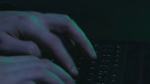Hacker with laptop typing 4 Stock Footage