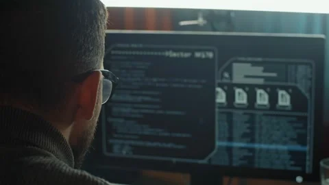 The hacker launched his network virus. His program code is working, and he is Stock Footage 171575347