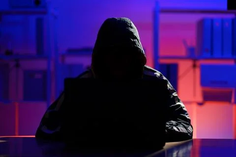 Hacker launching cyberattack targeting data systems and exposing cybersecurit Stock Photos