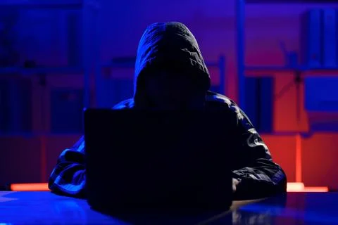 Hacker launching cyberattack targeting data systems and exposing cybersecurit Stock Photos