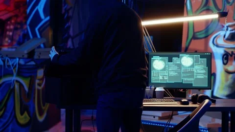 Hacker leaving secret underground base with SSD in briefcase Stock Footage 319522909