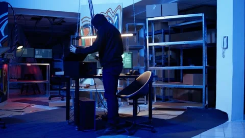 Hacker leaving secret underground base with SSD in briefcase Stock Footage 319549171