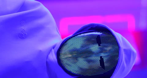 Hacker with LED Mask Working On Computers Stock Footage 260448476