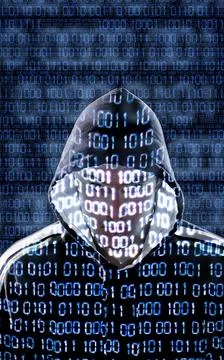 Hacker looking directly to the camera Stock Photos