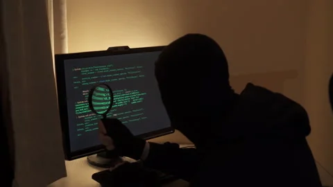 Hacker looking for a flaw in the program code. An attempt to hack the system. Stock Footage 146032861