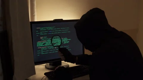 Hacker looking for a flaw in the program code. An attempt to hack the system. Stock Footage 146046788