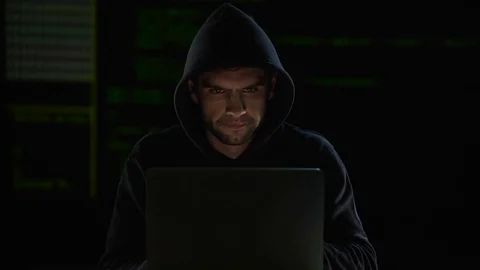 Hacker making changes to program code and waiting them to break system, hacking Video stock 84114886