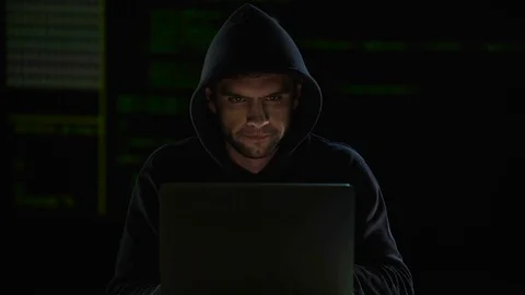 Hacker making changes to program code and waiting them to break system, hacking Video stock 84117016