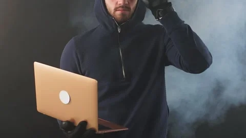 Hacker man, computer genius engaged in crime. Stock Footage 123475589