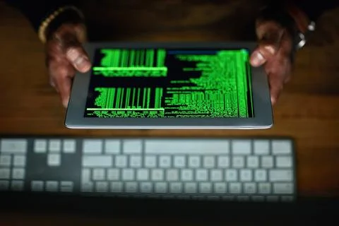 Hacker, man hands and tablet screen for software data, code or password in Fotos Stock