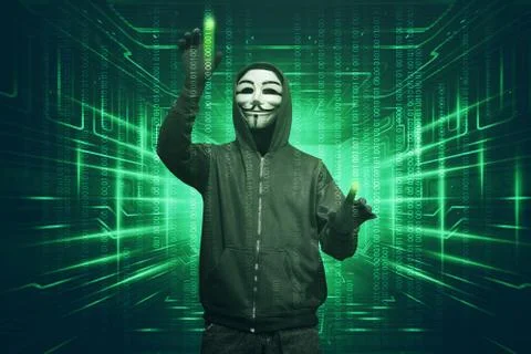 Hacker man with vendetta mask hacking binary system security code Stock Photos