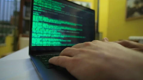 Hacker man working on pc laptop privacy data decript,cyber security attack Stock Footage 212380401