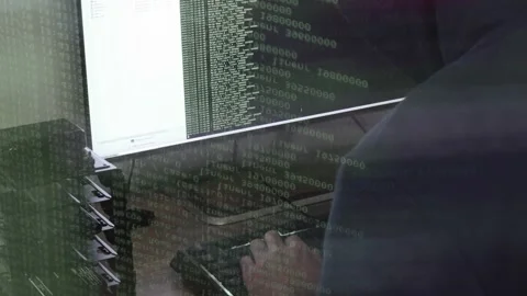 A hacker man writes the white code for an attack. Program a virus with your c Stock Footage 145691444